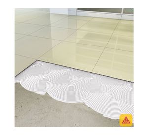 Adhesivo cerámico porcelanato 25 kg Sikaceram 100 gris Sika.