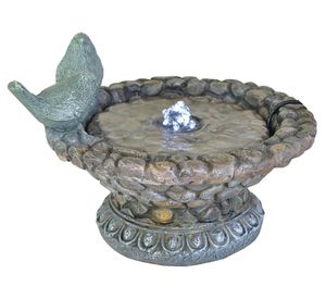 Fuente de agua con ave Outzen